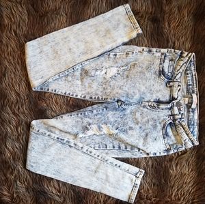 Acid washed distressed jeans
